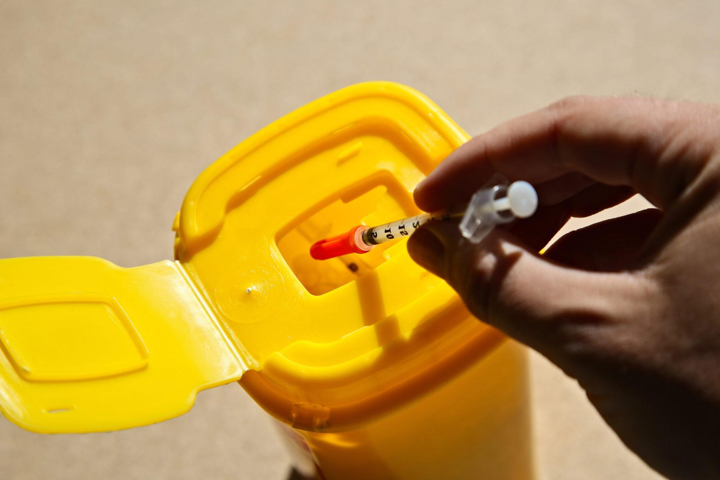 Patient properly disposing a semaglutide needle